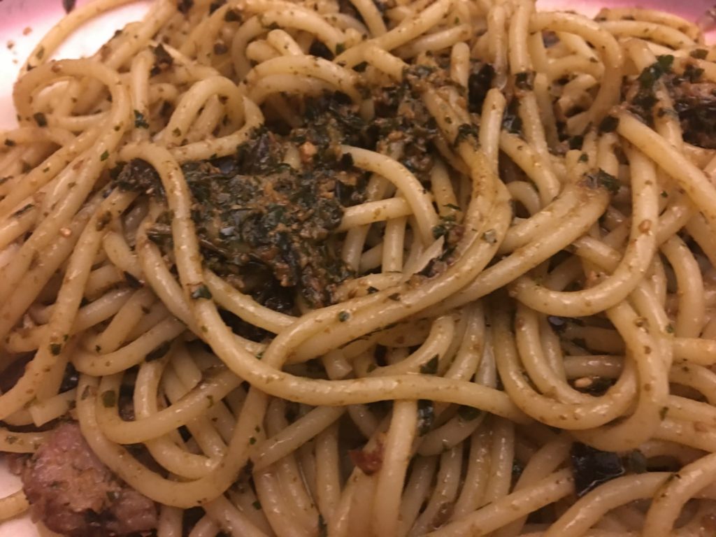 Homemade pasta with homemade pesto sauce