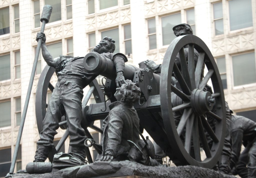 One of four bronze statues that surround the monument. Called "At Short Range" it is a representation of the Artillery Group