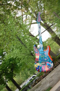 One of many colorful guitars that can be found throughout the city