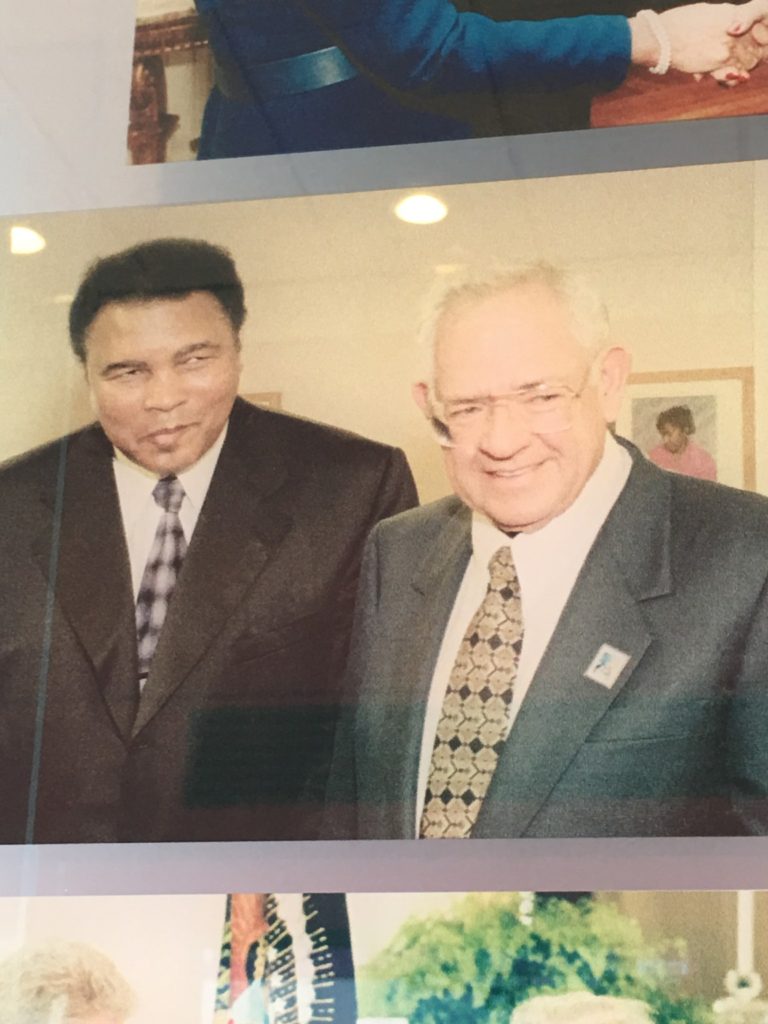 A photo of Dave Thomas with famed boxer Muhammad Ali